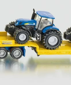 SIKU 1805 1:87 FREIGHTLINER WITH 2 NEW HOLLAND TRACTORS